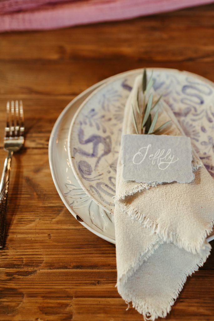 olive branch table setting with ceramic plates