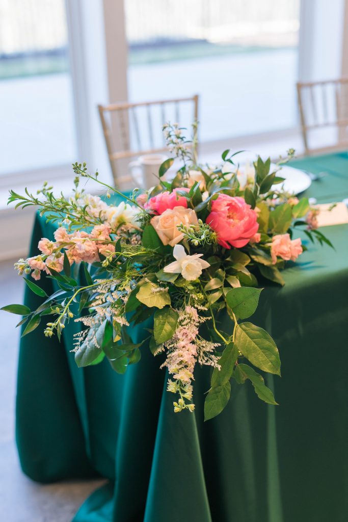 emerald and pink wedding sweetheart table