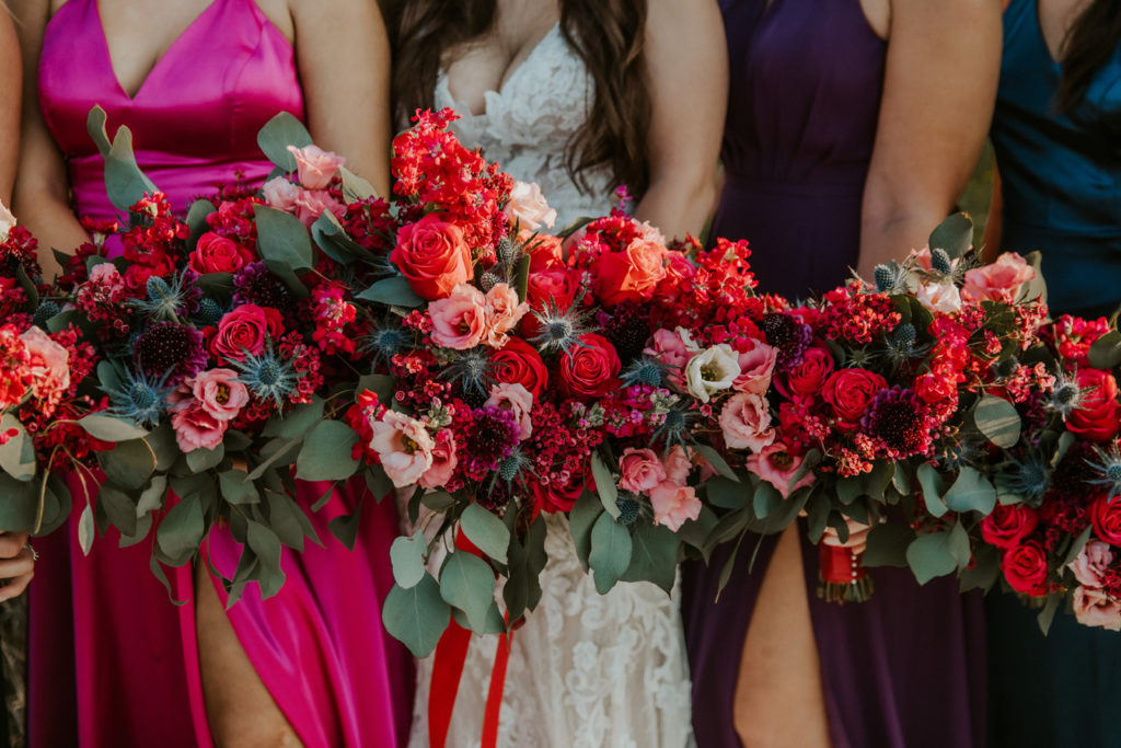jewel toned bouquets wedding