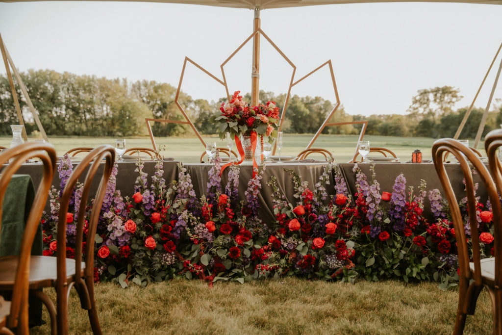 jewel toned celestial backyard wedding head table