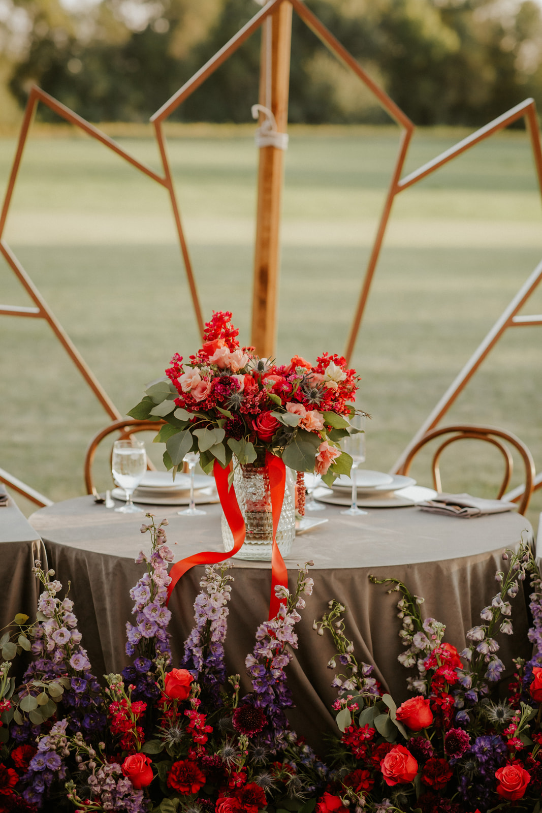 jewel toned celestial backyard wedding head table